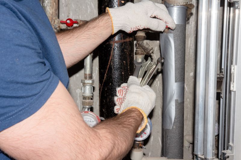 Plumber Repairing Pipes